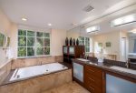 Master ensuite with spa tub and his-n-hers sinks